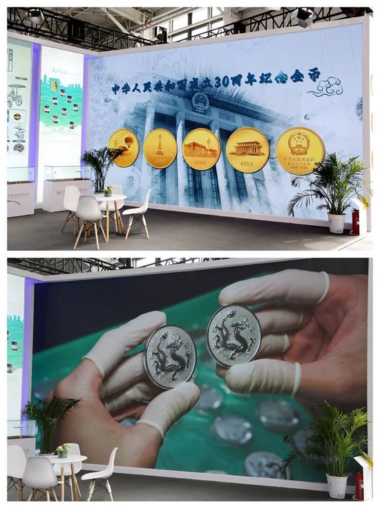 展台大屏幕循环播放中国金币集团有限公司形象宣传片和最新发行项目的宣传视频